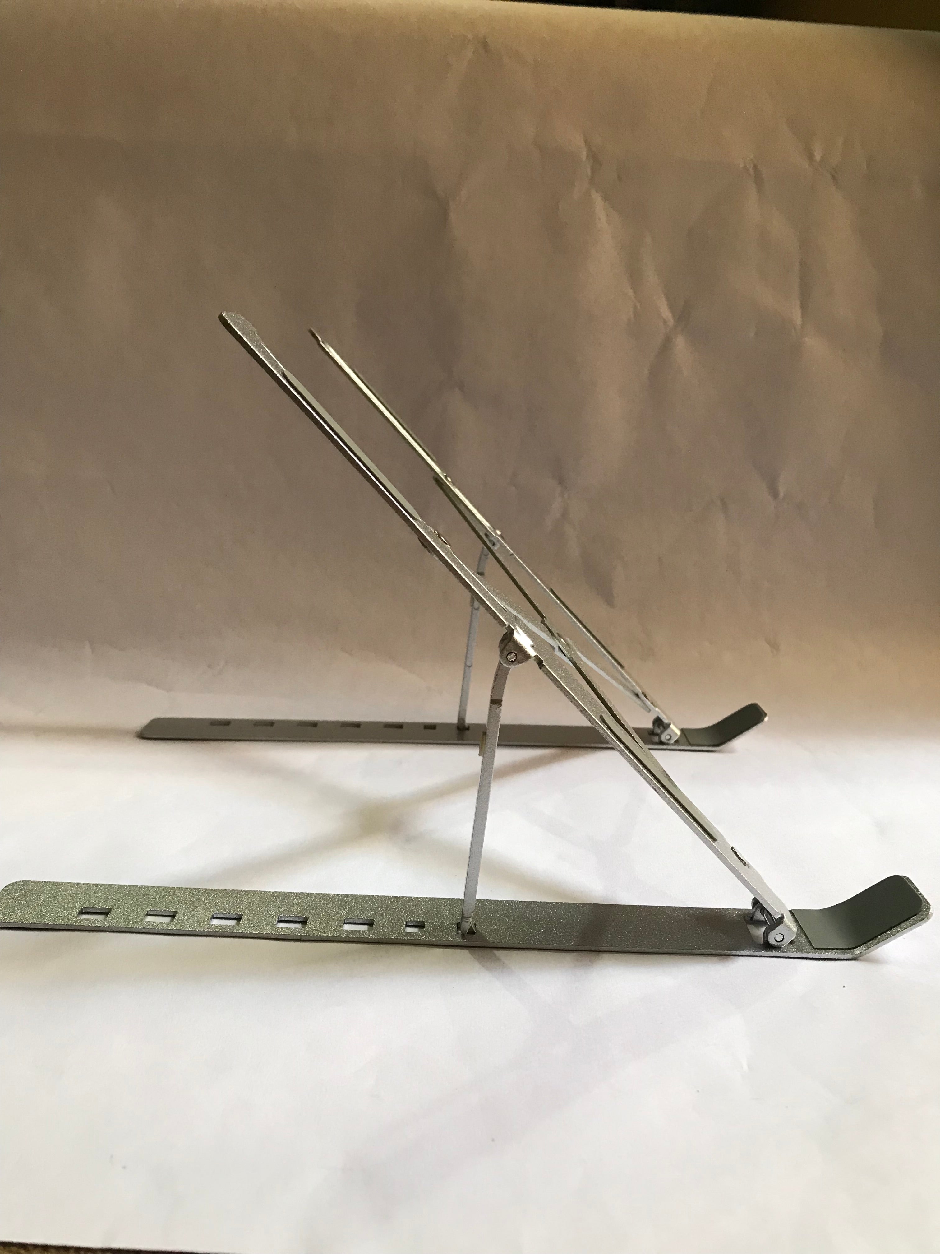Portable Metal Laptop Stand – Foldable & Height-Adjustable Ergonomic Riser